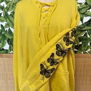 Plus size yellow & black hoodie with black butterfly design.  Lace up front